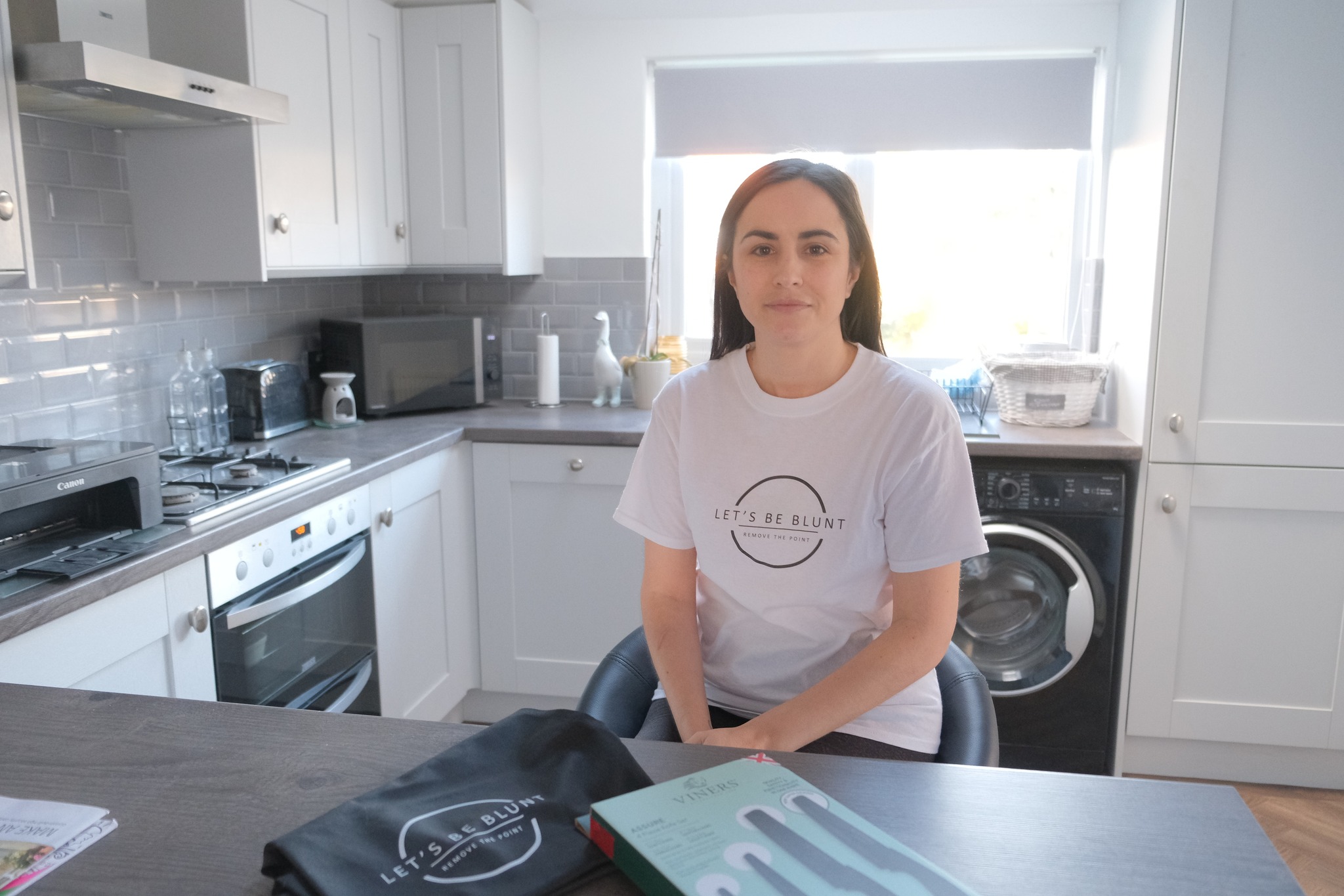 Leanne Lucas in her kitchen with blunt-ended knives 